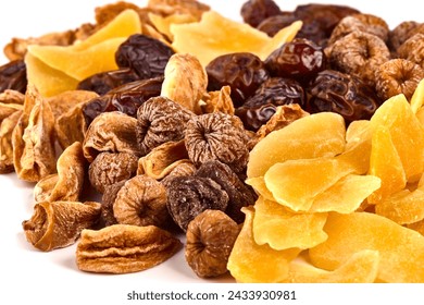 Healthy snack: mixed dried fruits, dried mango, dates, figs, dried persimmon, Close-up. - Powered by Shutterstock