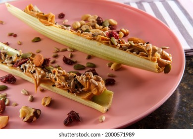 Healthy Snack Peanut Butter Celery Or Ants On A Log With Mixed Nuts And Seeds