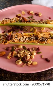 Healthy Snack Peanut Butter Celery Or Ants On A Log With Mixed Nuts And Seeds