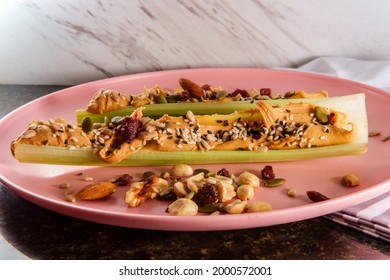 Healthy Snack Peanut Butter Celery Or Ants On A Log With Mixed Nuts And Seeds