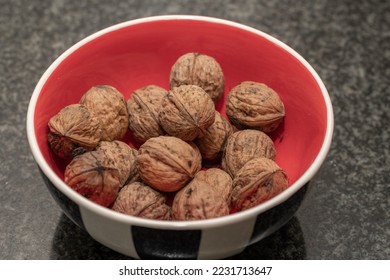 Healthy snack - Walnut in bowl - Shutterstock ID 2231713647