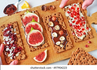 Healthy Snacks For Party: Set Of Crisp Rye Bread Sandwiches With Ham, Radish, Cucumber, Fig, Cranberry Jam, Soft Cheese And Chocolate Paste Over White Background.