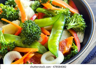 Healthy Stir Fried Vegetables In The Pan And Ingredients Close Up, Vegetarian Food