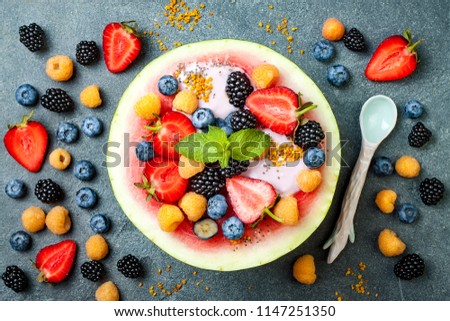 Similar – Foto Bild Wassermelonenschale gefüllt mit Obst