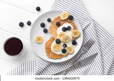 Healthy Summer Breakfast. Homemade Oatmeal Pancakes With Yogurt, Fresh Blueberry And Banana At White Wooden Background.