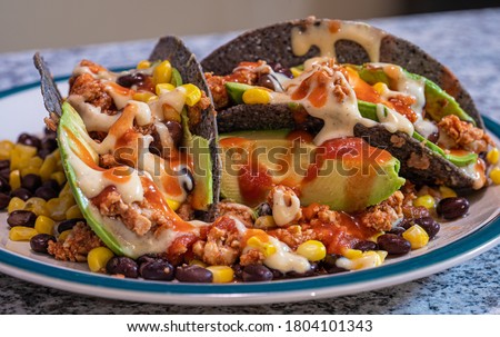Healthy tempeh tacos dripping with queso, hot sauce, and salsa Foto stock © 