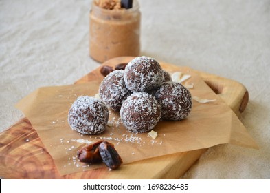 Healthy treats balls, made from peanut butter, almond butter and nuts - Shutterstock ID 1698236485