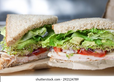 Healthy Turkey, Avocado, And Sprouts Sandwich On Whole Wheat Lunch