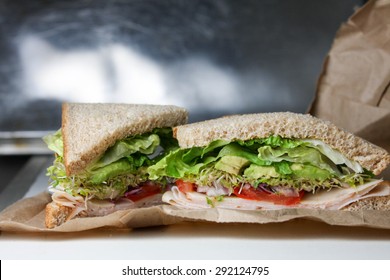 Healthy Turkey, Avocado, And Sprouts Sandwich On Whole Wheat Lunch