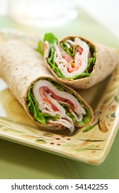 Healthy Turkey Wrap Sandwich With Lettuce, Tomato, Onion And Peppers