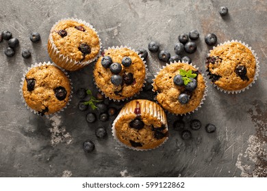 Healthy Vegan Banana Blueberry Muffins With Fresh Berries Overhead Shot