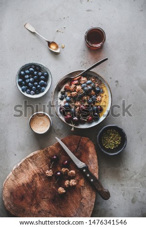 Similar – Zutaten für ein gesundes Frühstück mit Joghurt, Beeren und Chiasamen. Eine leere Schüssel, Draufsicht.