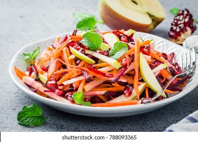 Healthy vegan carrot beetroot apple salad on stone background. Selective focus, copy space. - Powered by Shutterstock