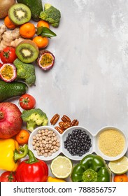 Healthy vegan food concept. Fruits vegetables background. Fresh vegetables, exotic and seasonal fruits, cereals, nuts and beans for a vegetarian diet. Copy space, frame background. - Shutterstock ID 788856757