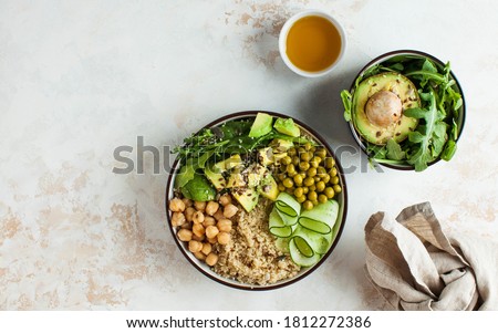 Healthy vegetable lunch from the Buddha bowl with quinoa, avocado, chickpeas. healthy food dish for vegetarians.