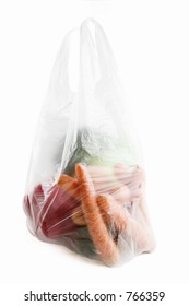 Healthy Vegetables In A Clear Plastic Grocery Bag On A White Background