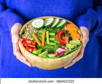 Healthy Vegetarian Dinner. Woman In Warm Sweater Holding Bowl With Fresh Salad, Avocado, Cereals, Beans, Vegetables And Word 