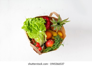 Healthy Vegetarian Food In Paper Bag From Above. Food Shopping And Clean Vegan Eating Concept.