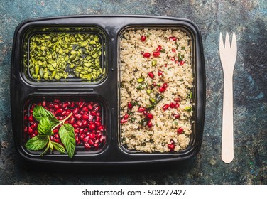 Healthy Vegetarian Lunch Box With  Quinoa Salad With Pomegranate And Pistachio, Top View