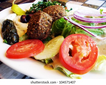 Healthy Vegetarian Lunch Or Dinner Of Greek Salad, Hummus, Dolma, And Falafel. Mediterranean, Middle Eastern Cuisine.