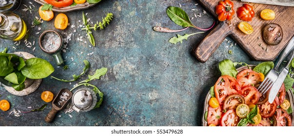 Healthy Vegetarian Salad Making Preparation With Tomatoes On Rustic Background, Top View, Banner, Copy Space