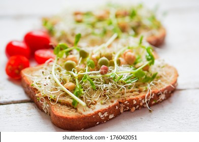 Healthy vegetarian sandwich with whole grain bread,alfalfa,hummus - Powered by Shutterstock