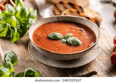 Healthy vegetarian tomato soup with parmesan and basil. Italian and Mediterranean food. - Powered by Shutterstock