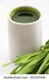 Healthy Way Of Life. Energy From Nature. Ecological Wheat-grass Juice. Regenerate Your Cells  Stop Ageing Processes And Detoxicate Your Body. High Key Isolated On White.