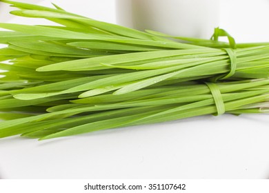 Healthy Way Of Life. Energy From Nature. Ecological Wheat-grass Juice. Regenerate Your Cells  Stop Ageing Processes And Detoxicate Your Body. High Key Isolated On White.