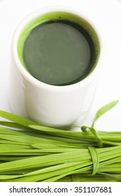 Healthy Way Of Life. Energy From Nature. Ecological Wheat-grass Juice. Regenerate Your Cells  Stop Ageing Processes And Detoxicate Your Body. High Key Isolated On White.