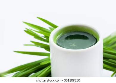 Healthy Way Of Life. Energy From Nature. Ecological Wheat-grass Juice. Regenerate Your Cells  Stop Ageing Processes And Detoxicate Your Body. High Key Isolated On White.