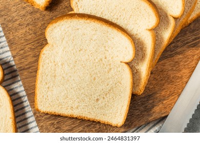 Healthy White Sandwich Bread Loaf Cut into Slices - Powered by Shutterstock