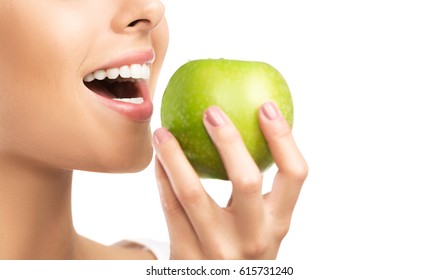 Healthy White Teeth Close Up With An Apple, Isolated On White Background