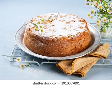 Healthy Wholemeal Apple Cinnamon Tea Cake On Light Blue Background With Copy Space. Homemade Baked Concept. Summer, Spring Time Recipe. Mother's Day, Birthday Cake Card Background.