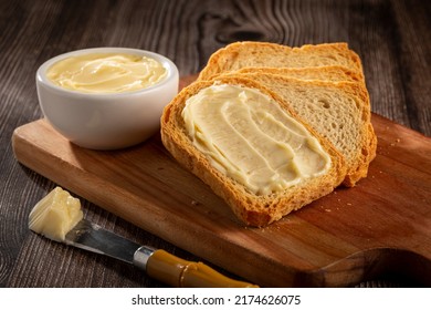 Healthy wholemeal toast with butter. - Shutterstock ID 2174626075