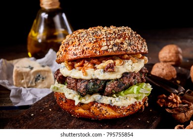 Healthy Wholewheat Walnut And Cheese Burger With A Thick Beef Patty Ob A Rustic Wood Table With Ingredients