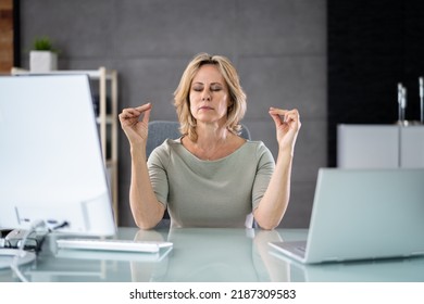 Healthy Yoga Meditation Exercise In Office Chair At Workplace