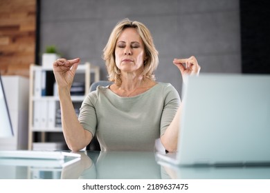 Healthy Yoga Meditation Exercise In Office Chair At Workplace