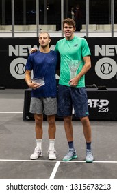 Heampstead, NY - February 17, 2019: Winner Reilly Opelka Of USA And Brayden Schnur Of Canada Pose With Trophies After Final Of New York Open ATP 250 Tournament At Nassau Coliseum