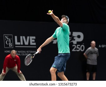 Heampstead, NY - February 17, 2019: Reilly Opelka Of USA Serves During Final Of New York Open ATP 250 Tournament Against Brayden Schnur Of Canada At Nassau Coliseum