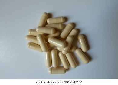 Heap Of Beige Capsules Of Milk Thistle Extract From Above