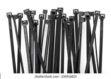 Heap Of Black Cable Ties On White Background