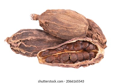 Heap Of Black Cardamom Pods Isolated On White Background. Black Cardamon Seeds. Clipping Path.