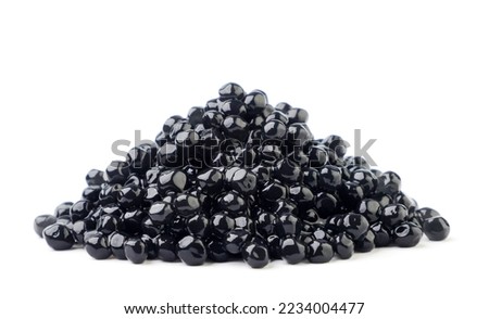 Heap of black caviar close-up on a white background. Isolated
