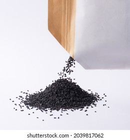 Heap Of Black Seeds, Also Known As Black Cumin Or Caraway Or Kalonji, Poured Out From A Packet, Mockup Template, Isolated On Neutral Background, Closeup