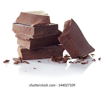 Heap Of Broken Pieces Of Chocolate On White Background