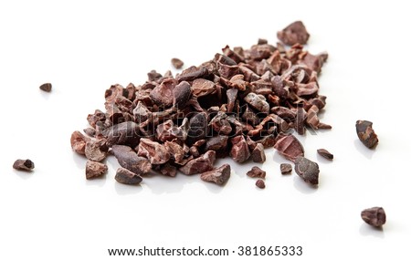 Heap of cacao nibs, isolated on white background