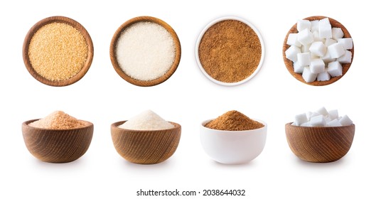 Heap of cane sugar, white and coconut sugar isolated on white  Top view. Brown and white sugar isolation in different angles. Natural sugar on wooden bowl  isolated on white. Selective focus.