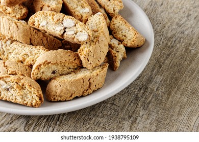 Heap of Cantuccini cookie biscuits with almonds nuts. Crunchy traditional Italian snack.