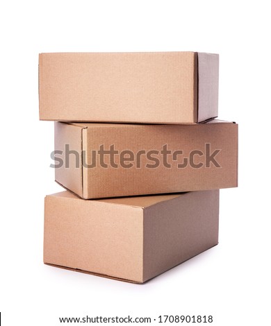 Heap of cardboard boxes isolated on white background. Carton delivery packaging, recycling brown boxes